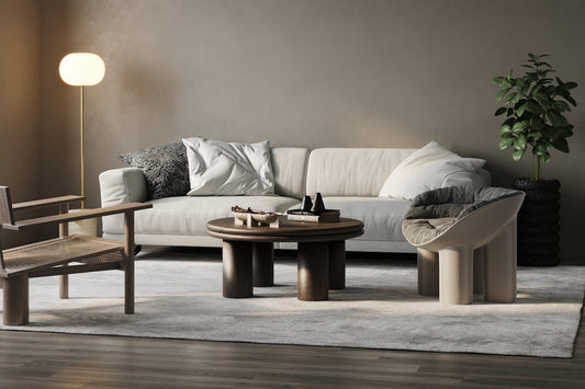 a living room with a couch, chair and table
