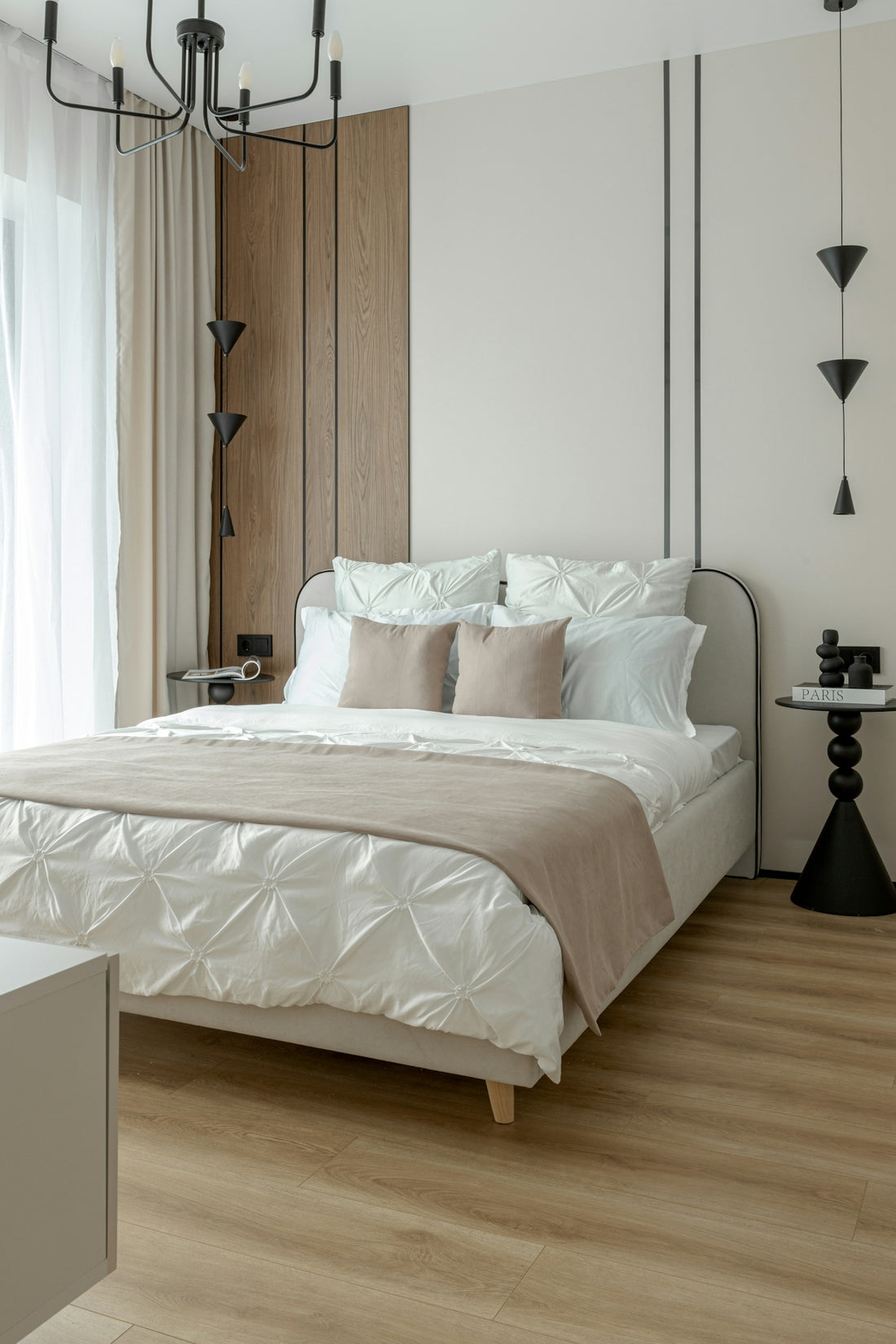 A modern bedroom with a neatly made bed